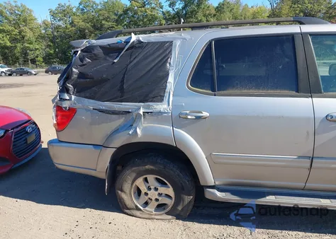 2001 Toyota Sequoia Limited V8 из США, поврежденный, VIN 5TDBT48A71S034309